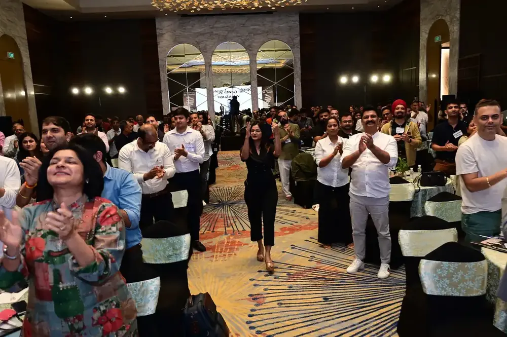 Audience applauding a breakthrough
